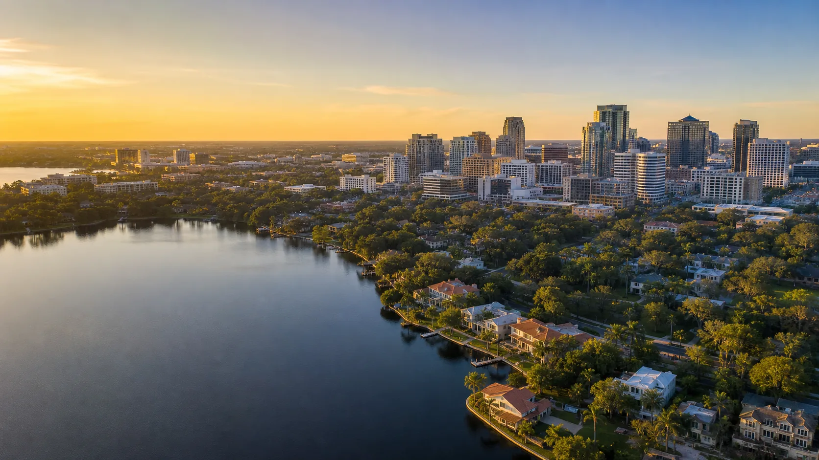 Aerial view of Orlando waterfront neighborhoods at golden hour